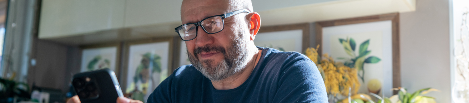 Man looking at mobile phone